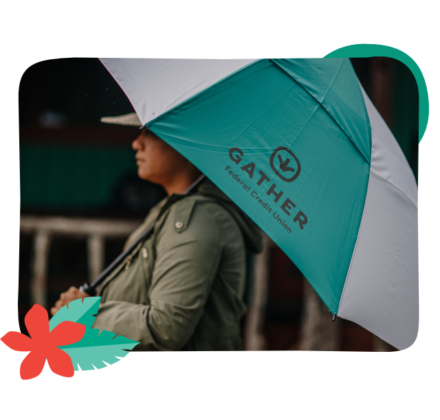 Woman holding Gather FCU umbrella for a rainy day