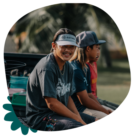 Young men lounging on back of truck