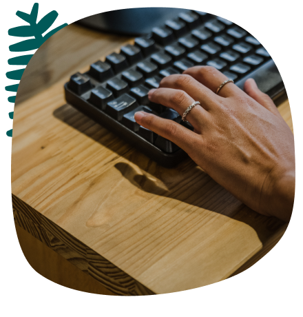 Person typing on keyboard