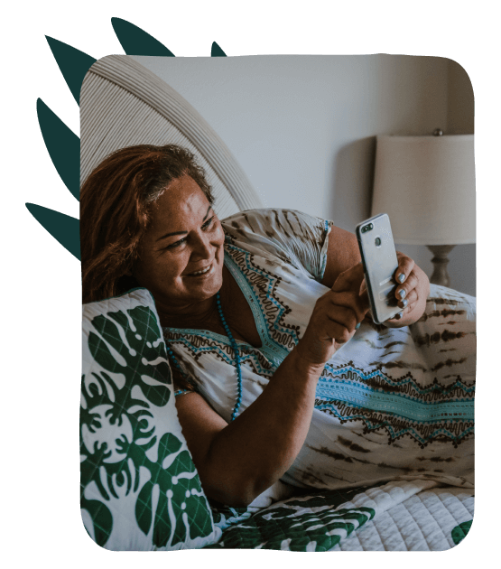 woman using a phone while relaxing
